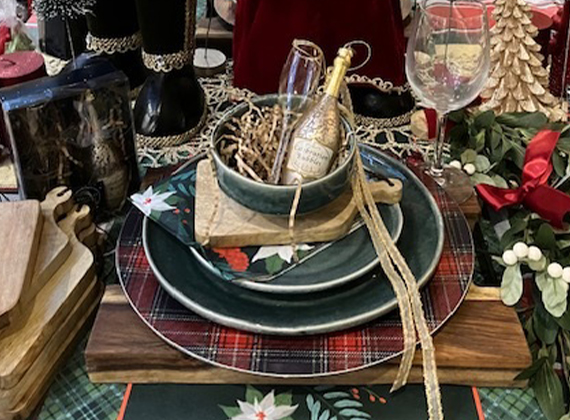 Christmas napkins on a table setting display