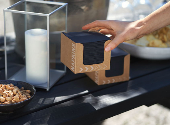 Convenient napkin dispenser on outdoor table