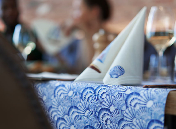 Blue design napkin on a restaurant table