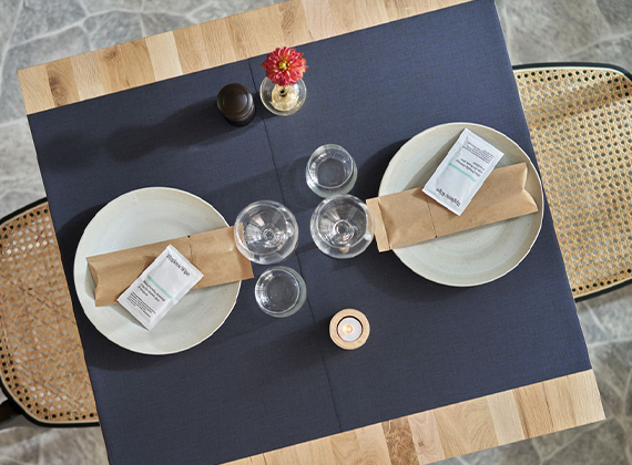 Large placemat across a two-seater restaurant table